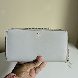 kate spade light Blue zip-around wallet with gold hardware